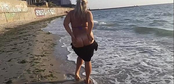  Hot milf masturbation on beach. So horny outside